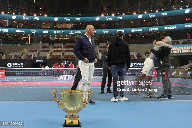 Dominic Thiem of Austria celebrate with team after win the Men's Singles final match against Stefanos Tsitsipas of Greece on Day nine of 2019 China...