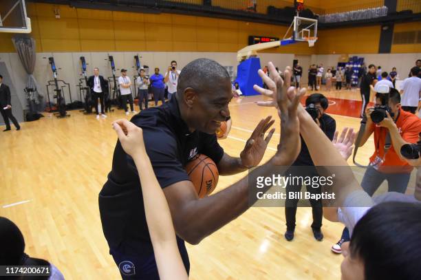 Legend Dikembe Mutombo participates during the NBA Cares Special Olympics Unified Clinic part of the 2019 NBA Japan Games at a training facility on...