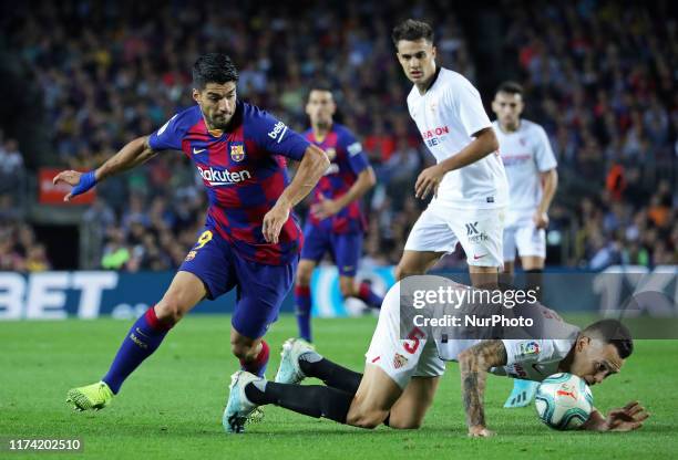 Lucas Ocampos and Luis Suarez during the match between FC Barcelona and Sevilla FC, corresponding to the week 8 of the spanish Liga Santarder, on...