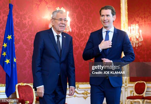 Austrian President Alexander Van der Bellen welcomes Sebastian Kurz, leader of Austria's People's party , to be named to form a new government, at...