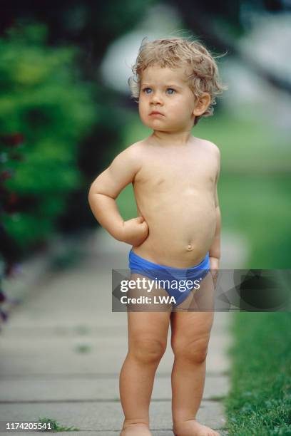 young child in speedo style swimsuit - speedo boy stock pictures, royalty-free photos & images