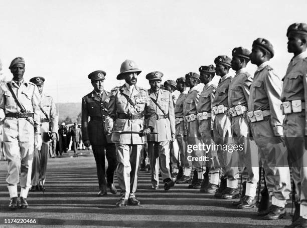 Undated picture of Emperor of Ethiopia Haile Selassie , the last Emperor of Ethiopia reviewing troops in Addis Ababa. Haile Selassie led the...