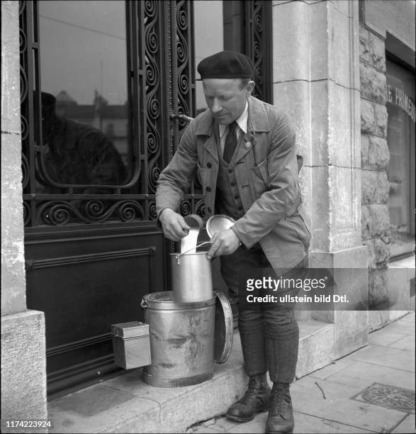 Milkman delivering milk in Geneva 1943