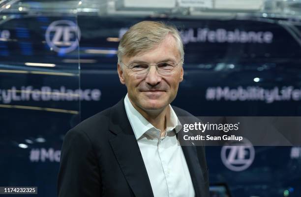 Wolf-Henning Scheider, CEO of automotive components manufacturer ZF Friedrichshafen AG, waits for German Chancellor Angela Merkel to visit the ZF...