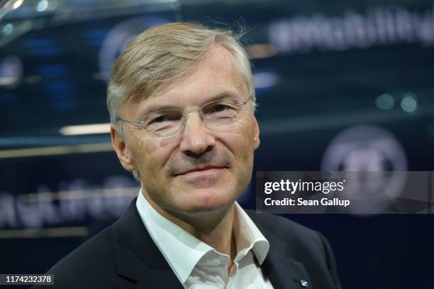 Wolf-Henning Scheider, CEO of automotive components manufacturer ZF Friedrichshafen AG, waits for German Chancellor Angela Merkel to visit the ZF...