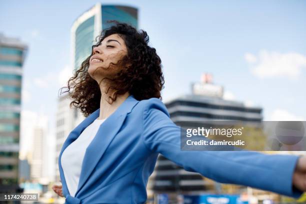 happy young businesswoman - arms raised stock pictures, royalty-free photos & images