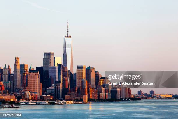 new york skyline with manhattan downtown financial district and hudson river, usa - skyline foto e immagini stock