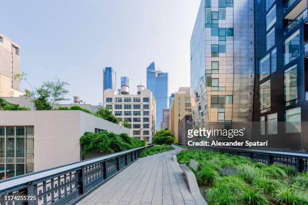 high line park and skyscrapers of hudson yards, new york city, usa - new york città foto e immagini stock
