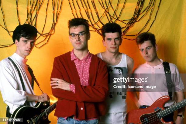 English guitarist Johnny Marr, English singer Morrissey, English drummer Mike Joyce and English bassist Andy Rourke of The Smiths pose for a portrait...