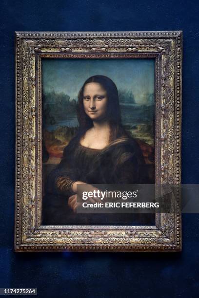 This picture shows Mona Lisa after it was returned at its place at the Louvre Museum in Paris on October 7, 2019. Leonardo da Vinci's masterpiece,...