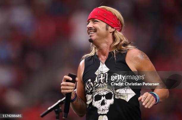 Musician Bret Michaels performs during a half-time show at the NFL game between the Arizona Cardinals # of the Arizona Cardinals and the Detroit...