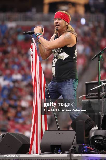 Musician Bret Michaels performs during a half-time show at the NFL game between the Arizona Cardinals # of the Arizona Cardinals and the Detroit...