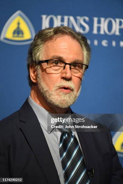 Dr. Gregg L. Semenza M.D., Ph.D addresses the media and a large crowd from Johns Hopkins Hospital at a press conference after learning he won the...