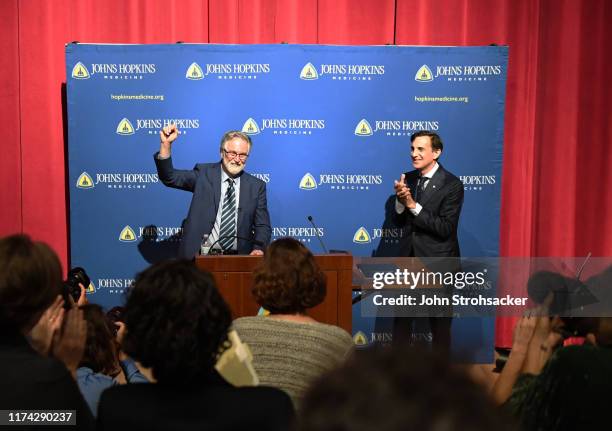 Dr. Gregg L. Semenza M.D., Ph.D and Johns Hopkins president Ronald Joel Daniels address the media and large crowd from Johns Hopkins Hospital at a...