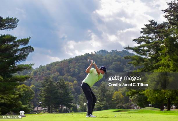 Henrik Norlander of Sweden plays his shot from the eighth tee during the first round of A Military Tribute At The Greenbrier held at the Old White...