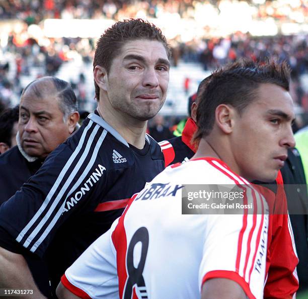 June 26: Juan Pablo Carrizo, from Rive Plate, cries after being defeated by Belgrano de Cordoba at the Monumental Vespucio Liberti Stadium on June 26...