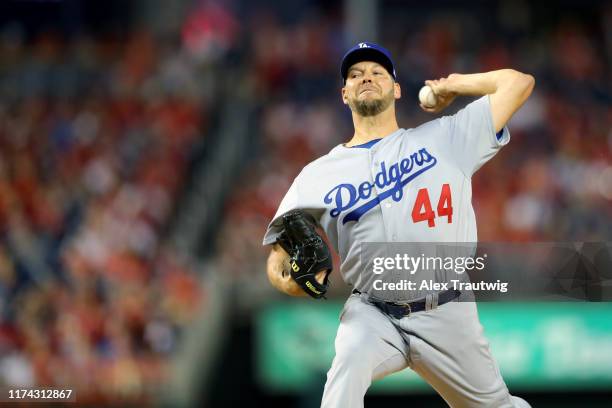 Rich Hill of the Los Angeles Dodgers pitches against the Washington Nationals during Game 4 of the NLDS between the Los Angeles Dodgers and the...