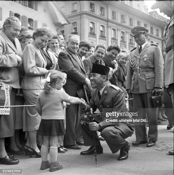 President Sukarno is greeting a Swiss girl, Berne 1956