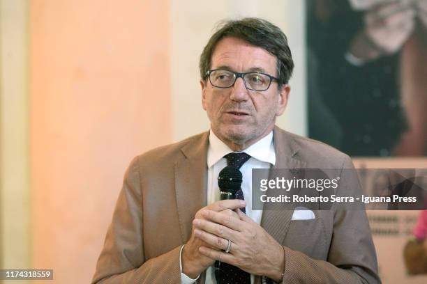 Gian Carlo Muzzarelli Mayor of Modena attends the inauguration of the american artist and photographer Steve McCurry exhibition "Leggere" at Galleria...