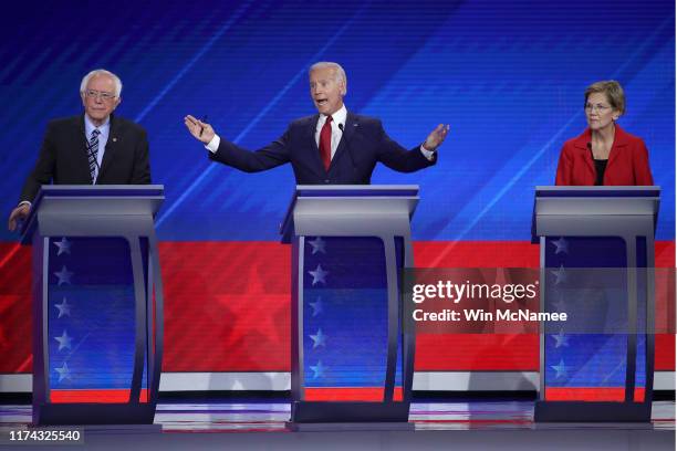 Democratic presidential candidate Sen. Bernie Sanders , former Vice President Joe Biden, and Sen. Elizabeth Warren debate on stage during the...