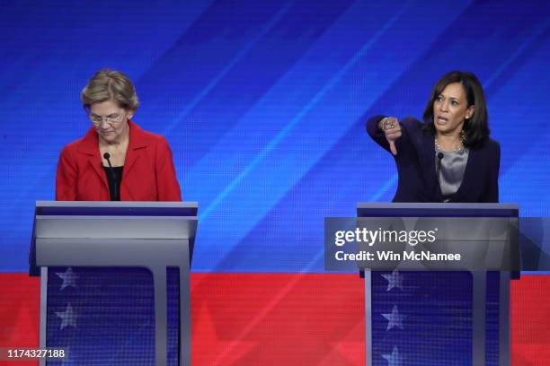 Democratic presidential candidates Sen. Elizabeth Warren and Sen. Kamala Harris interact on stage during the Democratic Presidential Debate at Texas...