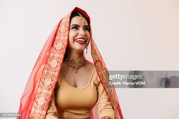 the biggest special occasion there is - woman in red sari stock pictures, royalty-free photos & images