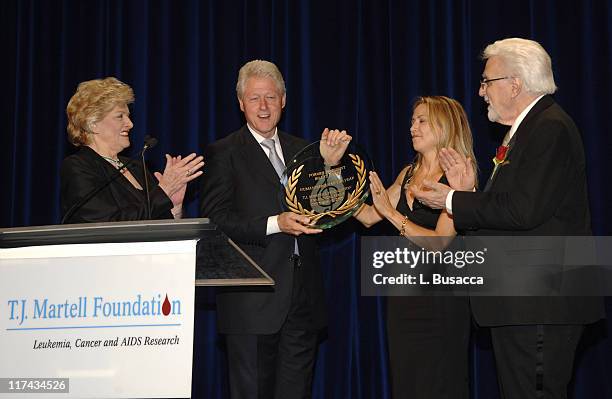 Frances Preston, President of the T.J. Martell Foundation, Sheryl Crow and Tony Martell, Chairman and Founder of the T.J. Martell Foundation present...