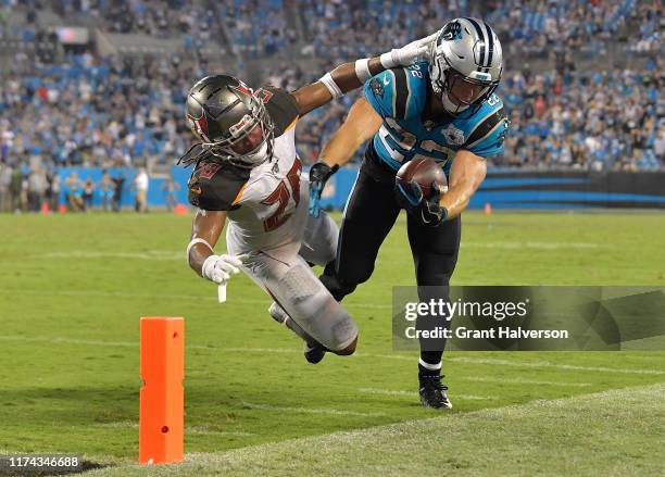 Vernon Hargreaves III of the Tampa Bay Buccaneers forces Christian McCaffrey of the Carolina Panthers out-of-bounds short of the first down marker on...