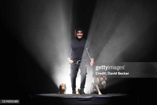 Dog trainer and television personality Cesar Millan performs during the opening night of his one-man show "Cesar Millan - My Story: Unleashed" at the...