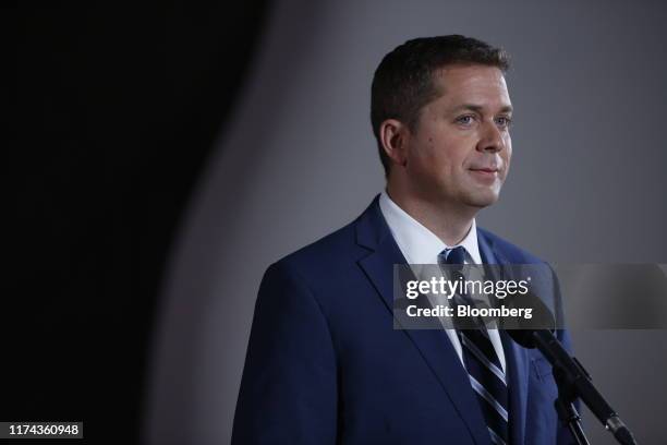 Andrew Scheer, leader of Canada's Conservative Party, listens while addressing members of the media following the federal leader's debate in...