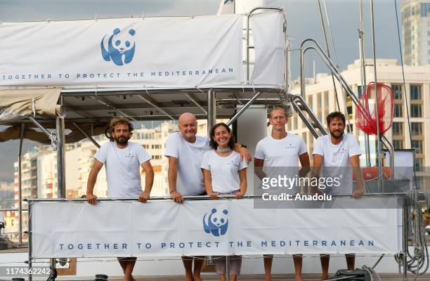 The crew of the World Wildlife Fund ship Blue Panda pose for a photo in Izmir, Turkey on October 04, 2019. In its maiden year, the World Wildlife...