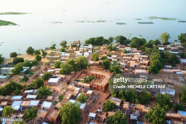 An aerial view shows the village Ségoukoro, the old town of Ségou in central Mali on September 29, 2019. With a rich past and the presence of dozens...