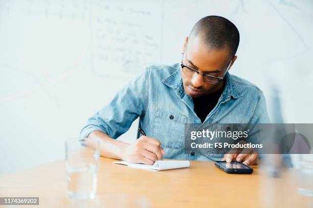 Writing Note On Phone Man Taking Notes On Phone Photos and Premium High Res Pictures - Getty ...