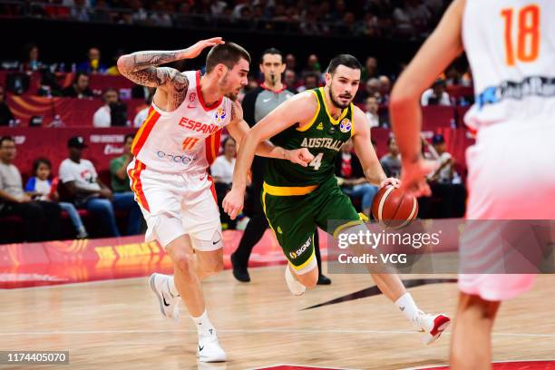 Chris Goulding of Australia handles the ball against Juancho Hernangomez of Spain during FIBA World Cup 2019 semi-final match between Spain and...