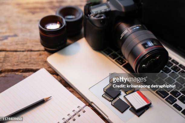 digital photography workstation, laptop computer and display. - digital single lens reflex camera stock pictures, royalty-free photos & images