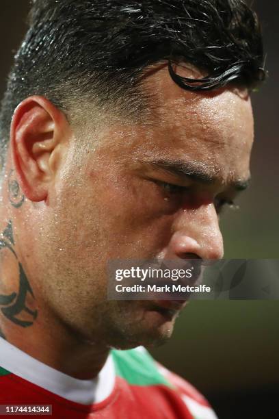 John Sutton of the Rabbitohs looks dejected as he walks off at half time during the NRL Qualifying Final match between the Sydney Roosters and the...