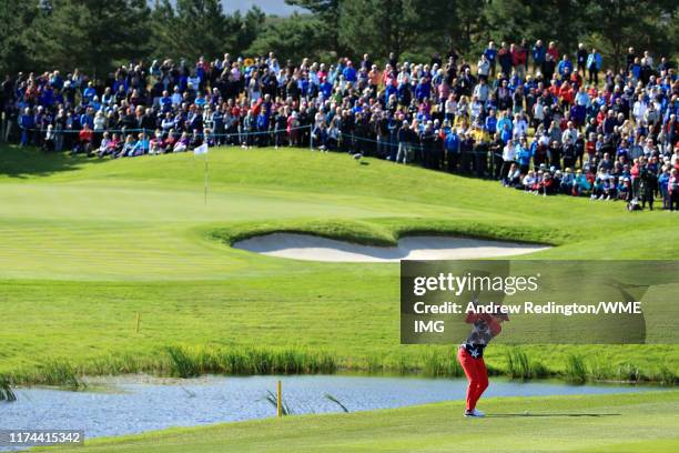 Marina Alex of Team USA plays her third shot on the sixteenth hole during Day 1 of The Solheim Cup at Gleneagles on September 13, 2019 in...