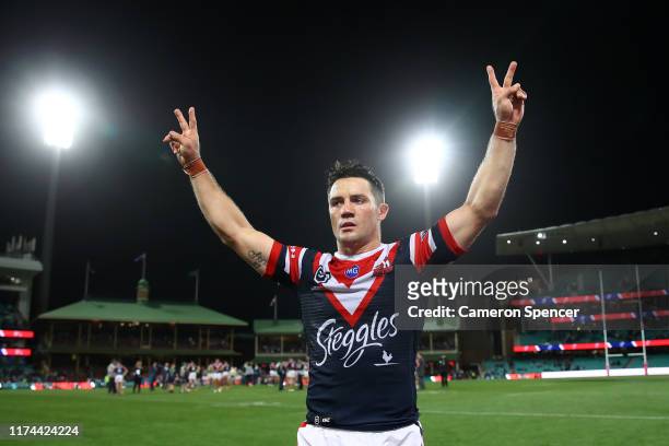 Cooper Cronk of the Roosters thanks fans after winning the NRL Qualifying Final match between the Sydney Roosters and the South Sydney Rabbitohs at...