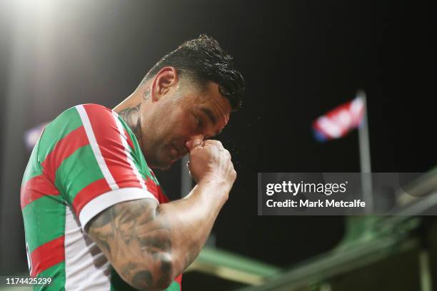 John Sutton of the Rabbitohs looks dejected as he walks off after defeat during the NRL Qualifying Final match between the Sydney Roosters and the...
