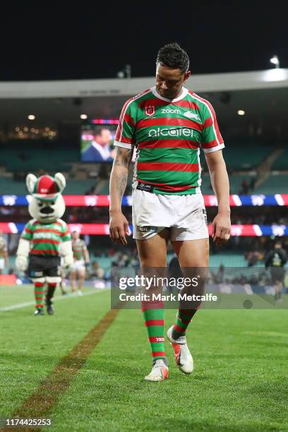 John Sutton of the Rabbitohs looks dejected as he walks off after defeat during the NRL Qualifying Final match between the Sydney Roosters and the...