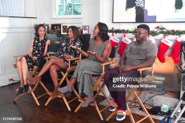 Anne-Marie Johnson, Reagan Gomez-Preston, Terri J. Vaughn and Ray J attend "Dear Santa, I Need a Date" Set Visit on September 12, 2019 in Atlanta,...