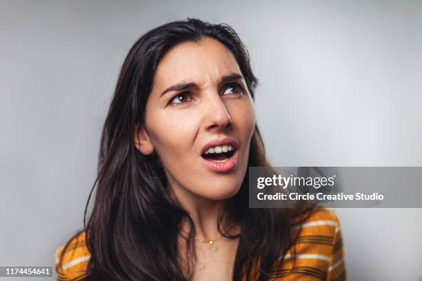 wtf! head shot portrait of shocked frustrated woman - scandal imagens e fotografias de stock