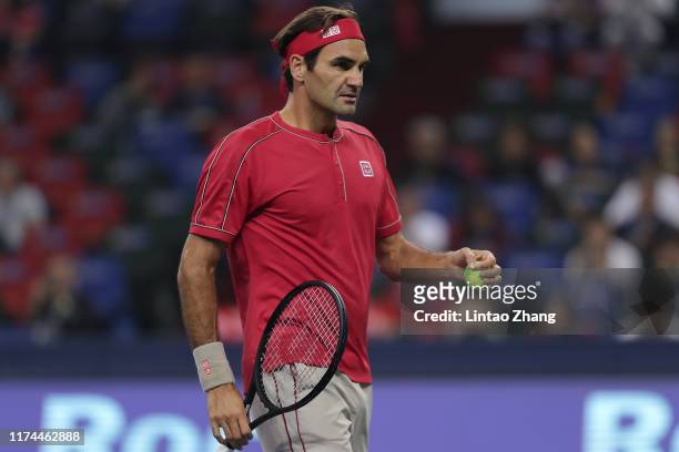 Roger Federer of Switzerland reacts during the match against Albert Ramos-Vinolas of Spain on day four of 2019 Rolex Shanghai Masters at Qi Zhong...