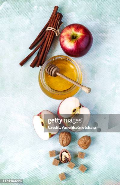 honey, apple, cinnamon, walnuts and brown sugar ingredients for baking an apple pie - brown apple stock pictures, royalty-free photos & images