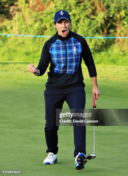 Carlota Ciganda of Team Europe celebrates her putt on the seventeenth green during Day 1 of The Solheim Cup at Gleneagles on September 13, 2019 in...