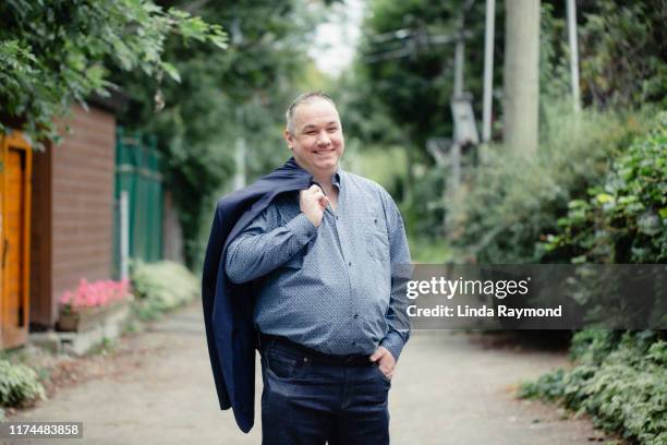 portrait of a mature man - male stomach stock pictures, royalty-free photos & images