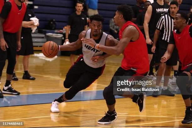 Jimmy Butler of the Miami Heat handles the ball during Training Camp on October 3, 2019 at American Airlines Arena in Miami, Florida. NOTE TO USER:...