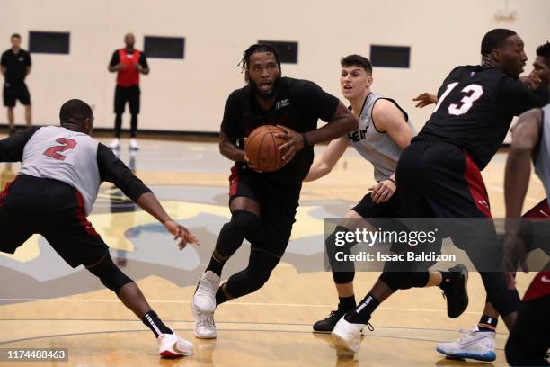 Justise Winslow of the Miami Heat handles the ball during Training Camp on October 3, 2019 at American Airlines Arena in Miami, Florida. NOTE TO...
