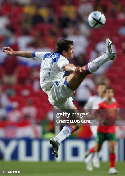 Russian forward Alexander Kerzhakov jumps for the ball, 16 June 2004 during their European Nations Championship football match at the Da Luz stadium...