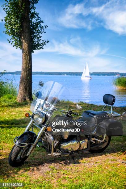 vacation with a motorcycle on the niegocin lake, masuria, poland - gizycko stock pictures, royalty-free photos & images